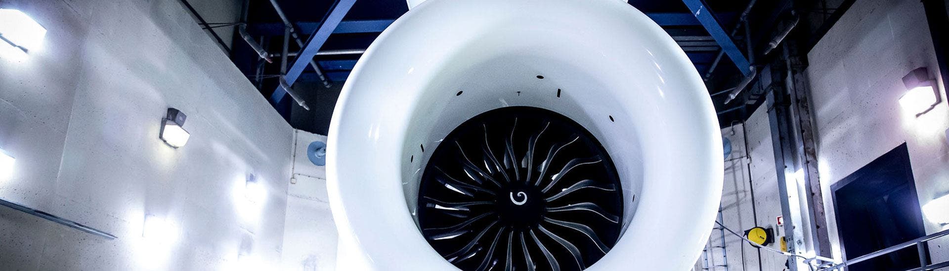 Close-up view of a high-bypass turbofan jet engine from an aircraft.